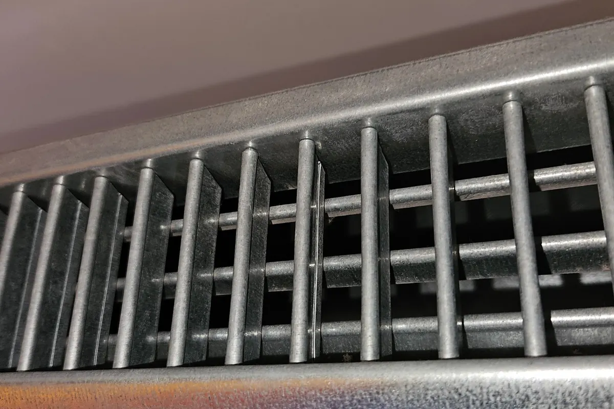 After: Grille: dust clogging the gaps between the blades