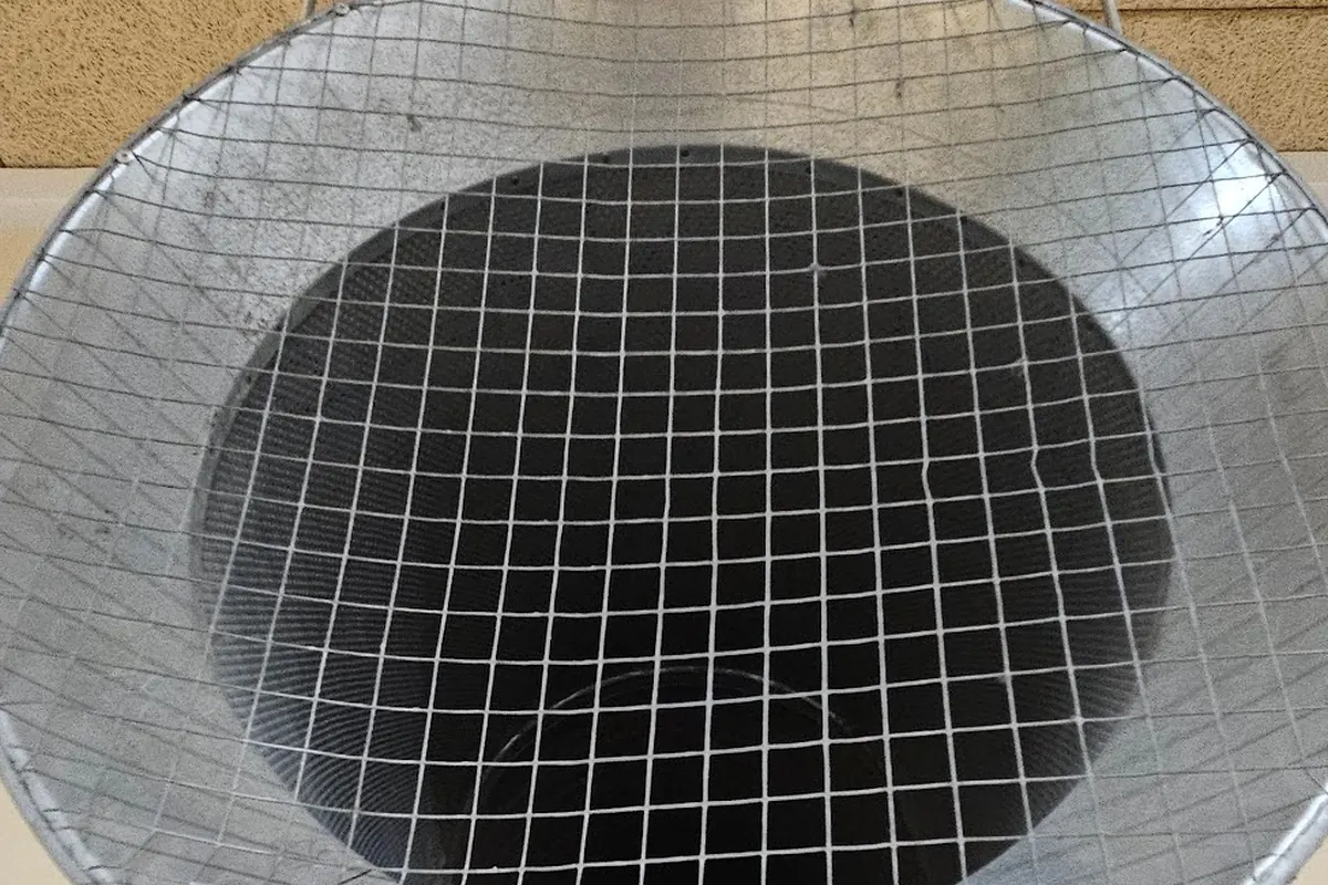 After: Mesh on a duct opening: dust clogging the holes